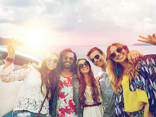 Image showing hippie friends at minivan car showing peace sign