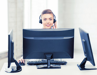 Image showing friendly female helpline operator