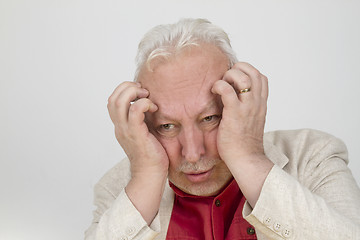 Image showing Senior man with strong headache