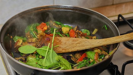 Image showing Preparing hot breakfast