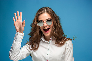 Image showing The young woman\'s portrait with happy emotions