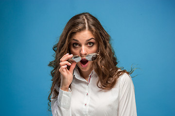 Image showing Portrait of young woman with shocked facial expression