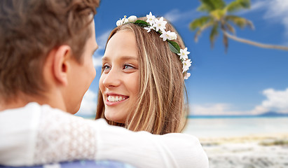 Image showing happy smiling young hippie couple on summer beach