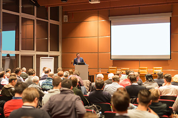 Image showing Business speaker giving a talk at business conference event.