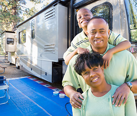 Image showing Happy African American Family In Front of Their Beautiful RV At 