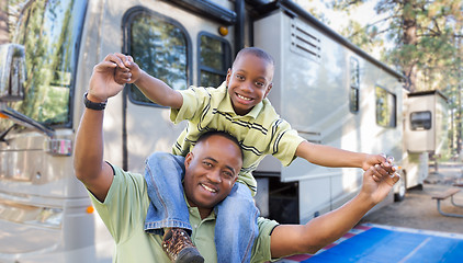 Image showing Happy African American Father and Son In Front of Their Beautifu