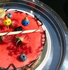 Image showing Pastry with strawberry mousse and red currants