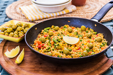 Image showing Vegetarian paella with olives