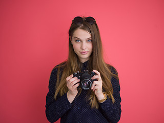 Image showing girl taking photo on a retro camera