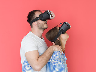 Image showing happy couple using VR-headset glasses of virtual reality