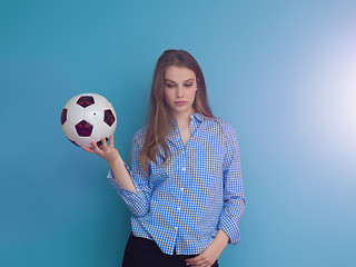 Image showing young woman playing with a soccer ball