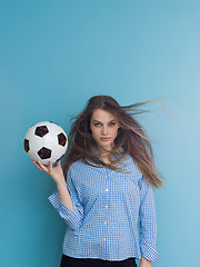 Image showing young woman playing with a soccer ball