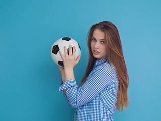 Image showing young woman playing with a soccer ball