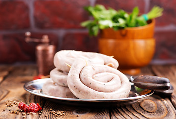 Image showing raw sausages