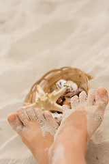 Image showing feet on sand