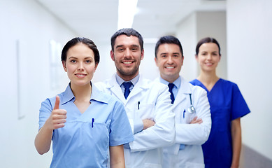 Image showing medics or doctors at hospital showing thumbs up