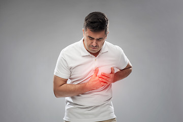 Image showing unhappy man suffering from heart ache