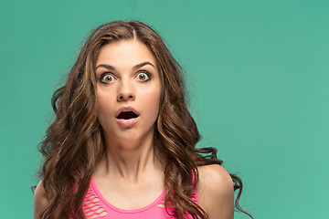 Image showing Portrait of young woman with shocked facial expression