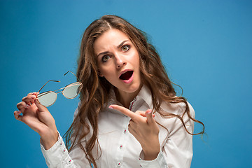 Image showing Portrait of young woman with shocked facial expression