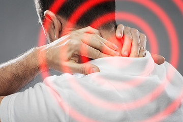 Image showing close up of man suffering from neck pain