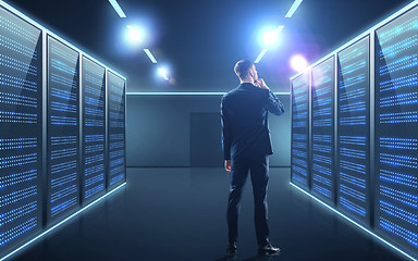 Image showing businessman over server room background