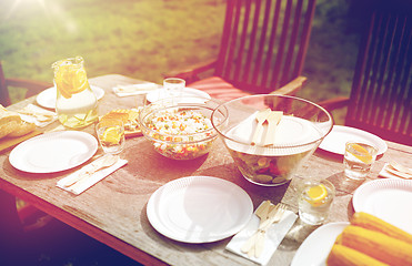 Image showing table with food for dinner at summer garden party