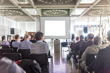 Image showing Business speaker giving a talk at business conference event.