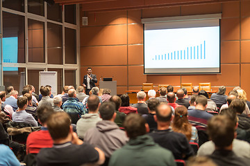 Image showing Business speaker giving a talk at business conference event.