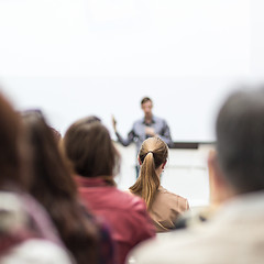 Image showing Public speaker giving talk at Business Event.