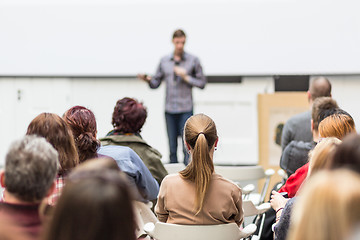 Image showing Public speaker giving talk at Business Event.