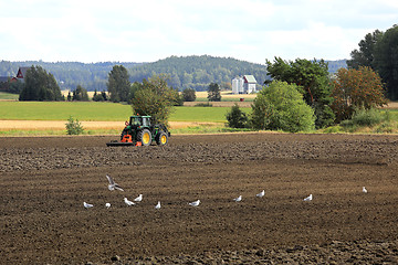Image showing Landscape of Tractor Working on Field