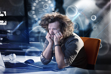 Image showing businessman relaxing at the desk