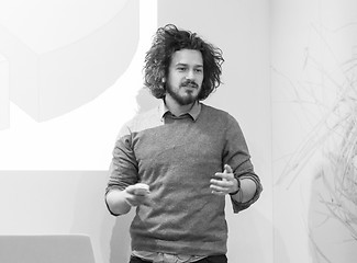 Image showing Young teacher in academy classroom