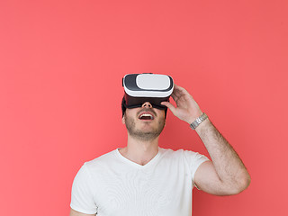 Image showing young man using VR headset glasses of virtual reality