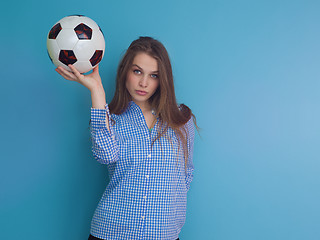 Image showing young woman playing with a soccer ball