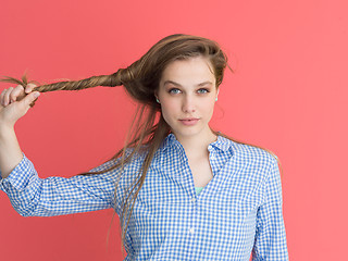 Image showing woman playing with her long silky hair