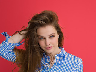 Image showing woman playing with her long silky hair