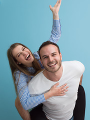 Image showing young man piggybacking his girlfriend