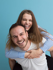 Image showing young man piggybacking his girlfriend