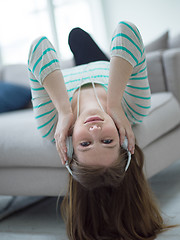 Image showing girl enjoying music through headphones