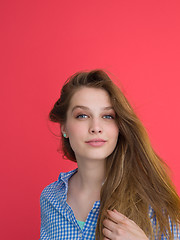 Image showing woman playing with her long silky hair