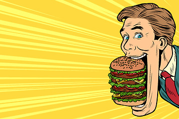 Image showing hungry man with a giant Burger, street food