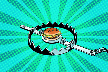 Image showing Iron trap with the Burger. concept of hunger and diet