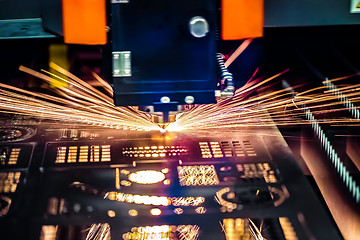 Image showing CNC Laser cutting of metal, modern industrial technology.