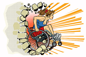 Image showing Caucasian woman athlete in a wheelchair punches the wall