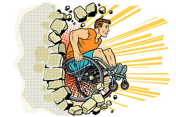 Image showing Caucasian male athlete in a wheelchair punches the wall