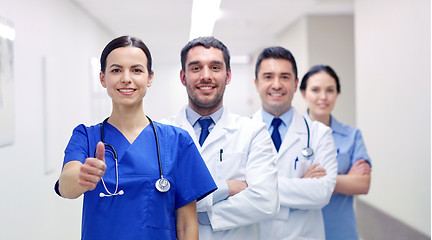 Image showing medics or doctors at hospital showing thumbs up