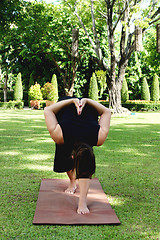 Image showing Yoga in the park.