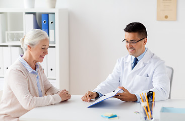 Image showing senior woman and doctor meeting at hospital