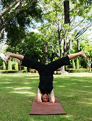 Image showing Yoga in the park.